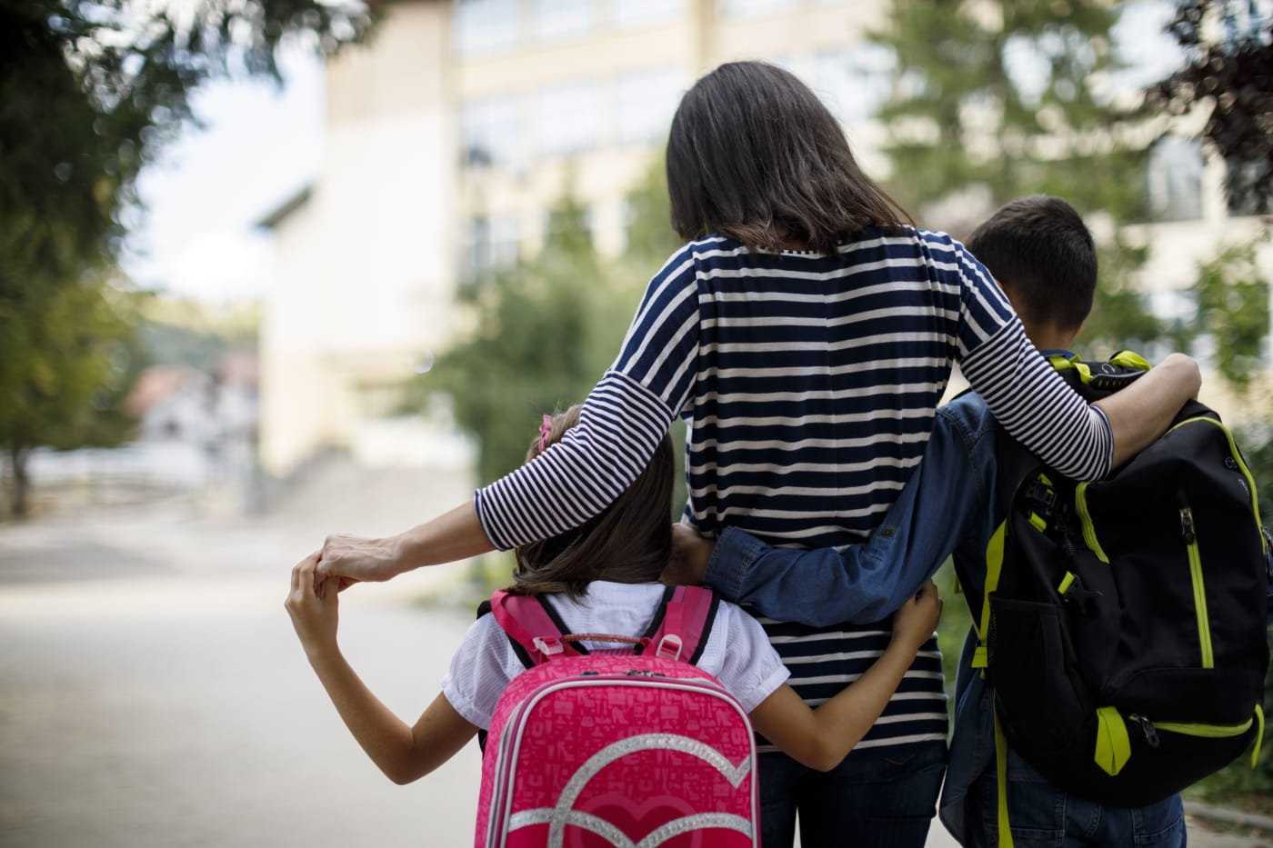 Mom walking with children